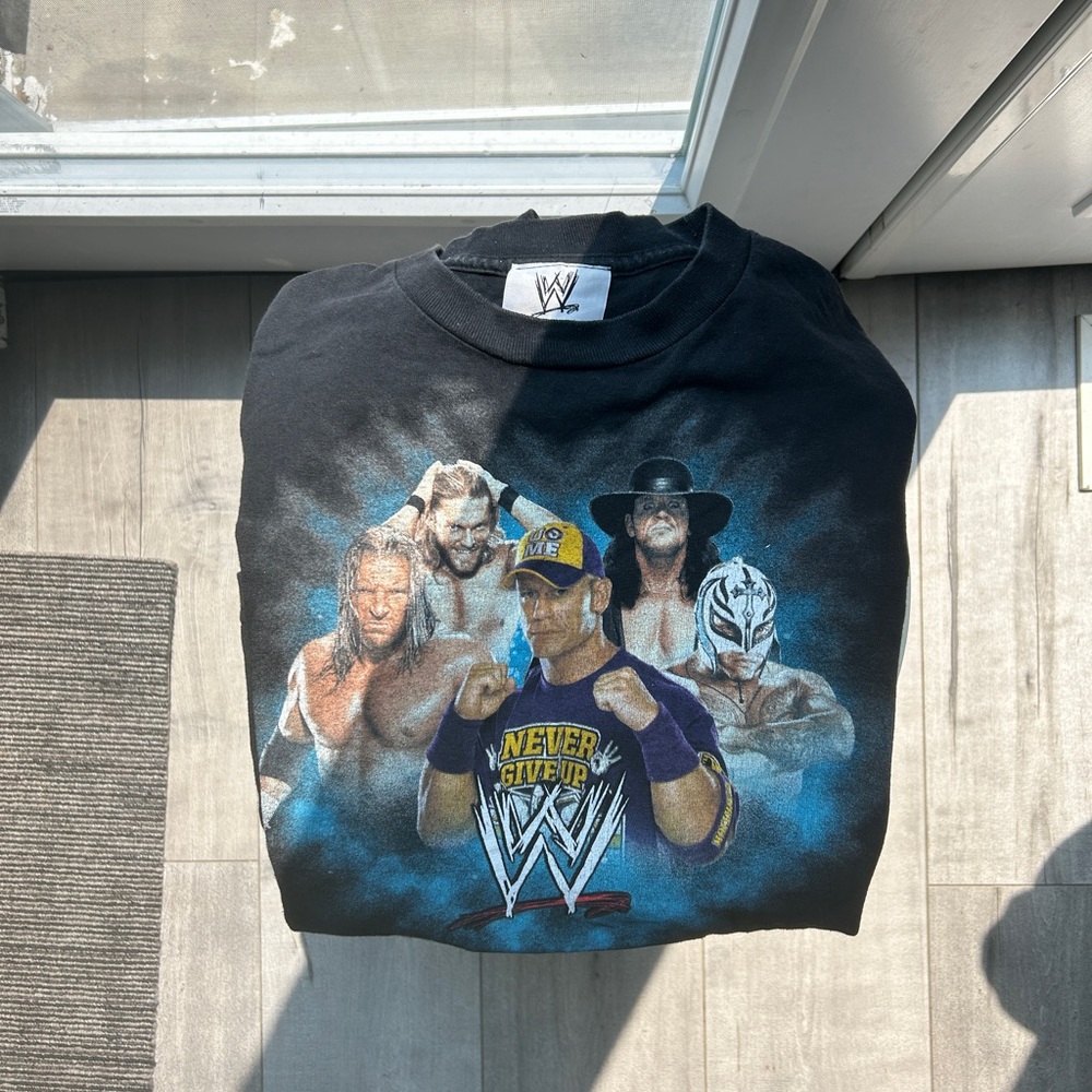 Vintage 2011 WWE Black Youth T-Shirt with Iconic Wrestler Graphics